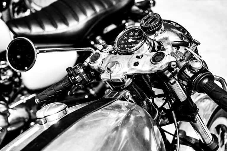 close up grayscale shot of an old motorcycle contr 2023 11 27 04 56 57 utc 768x511